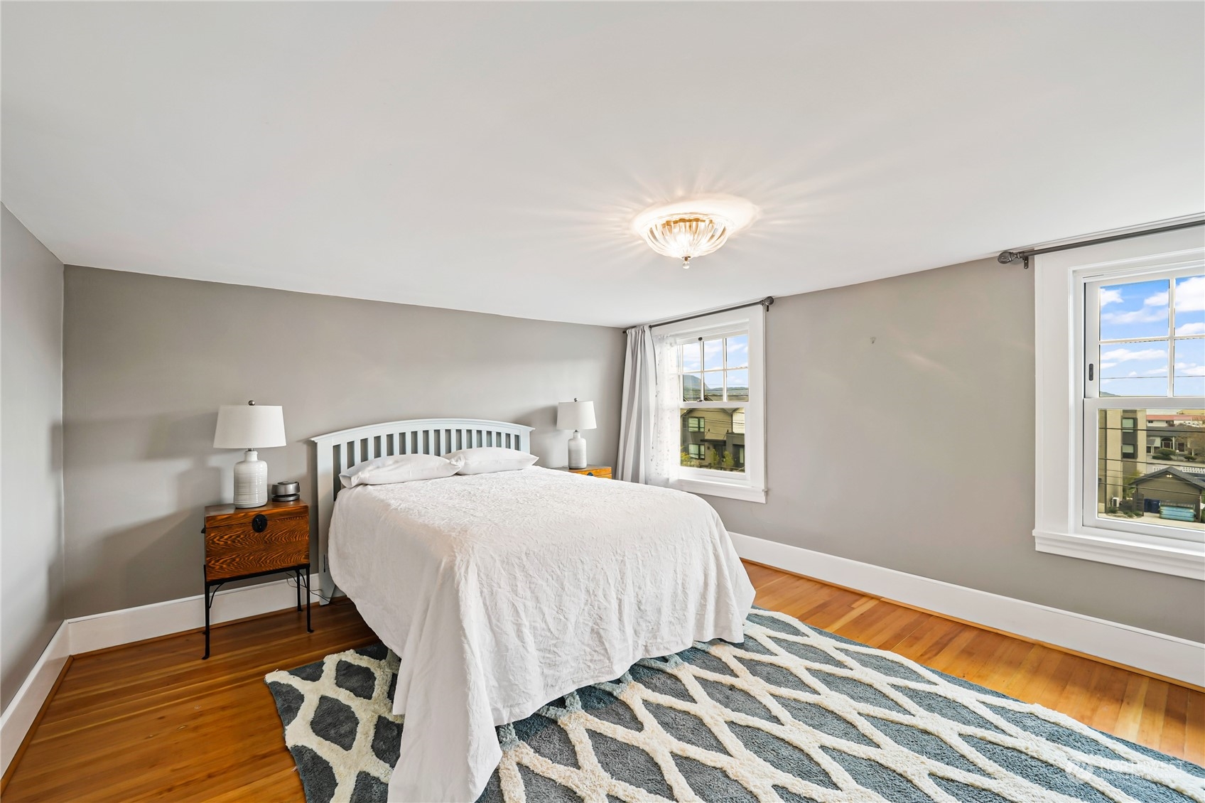 5918 Sunset Avenue Anacortes, WA 98221 - Photo 29 of 38 a bedroom with a bed and a window