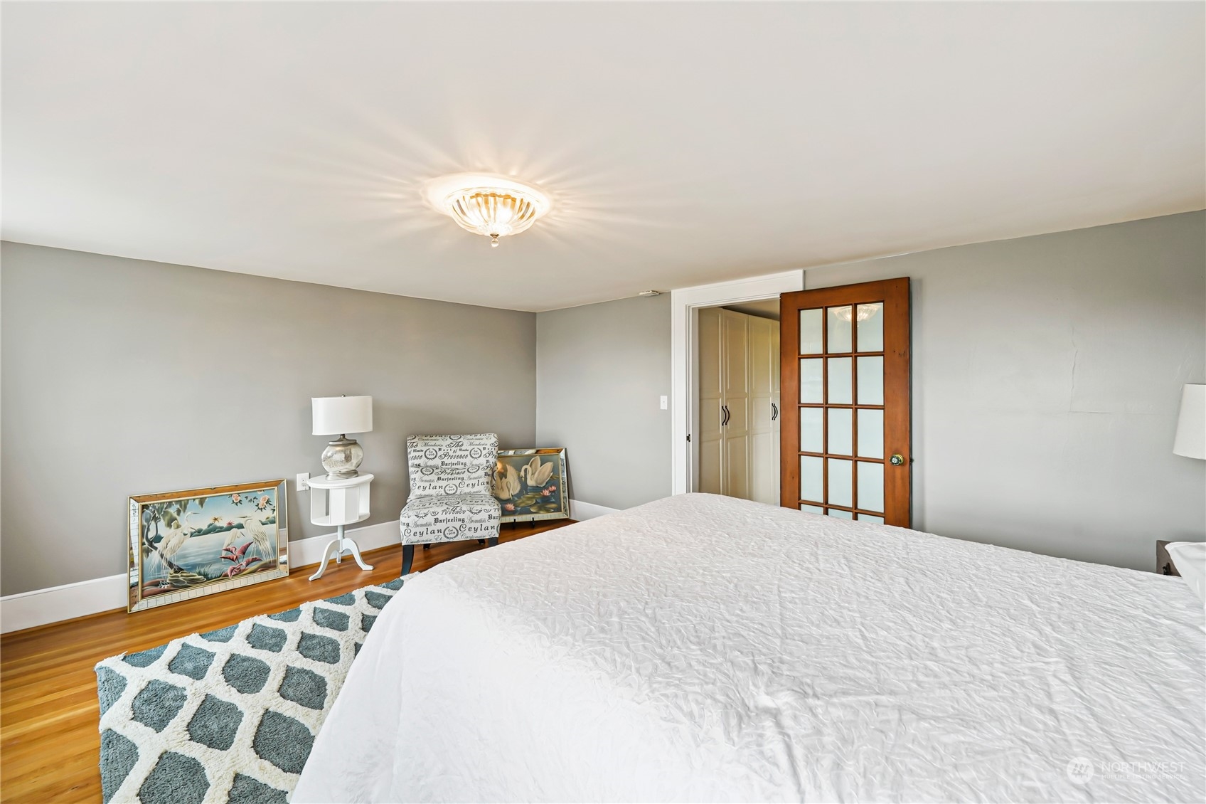5918 Sunset Avenue Anacortes, WA 98221 - Photo 31 of 38 a bedroom with bed and window