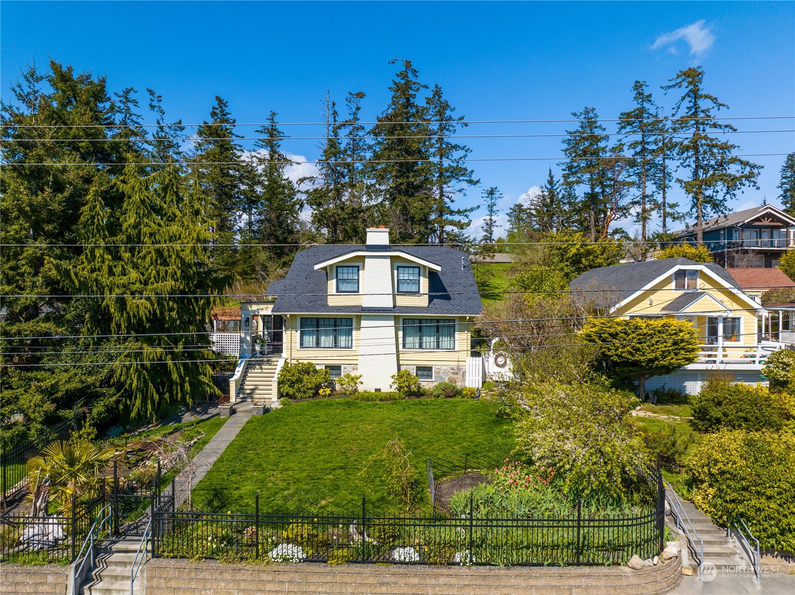 5918 Sunset Avenue Anacortes, WA 98221 - Photo 35 of 38 a front view of a house with garden