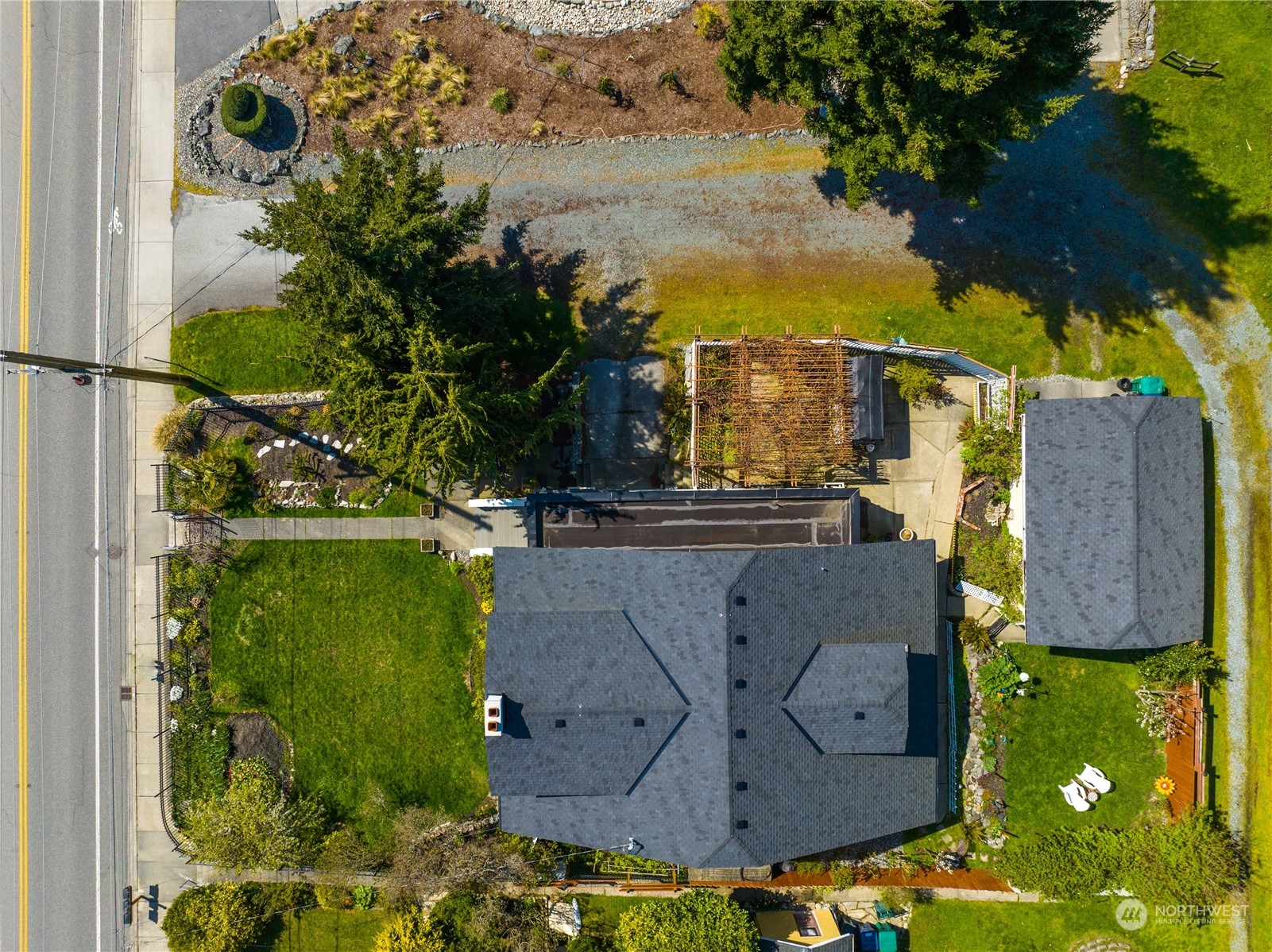 5918 Sunset Avenue Anacortes, WA 98221 - Photo 36 of 38 an aerial view of a house with a yard basket ball court and outdoor seating