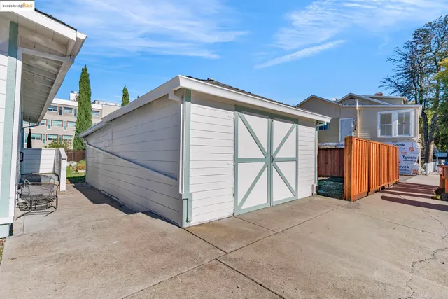 a kitchen with a sink cabinets and appliances