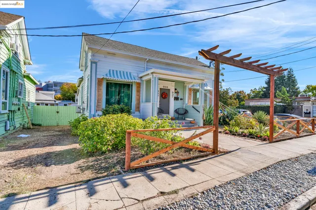 a view of a house with sitting area and glass door