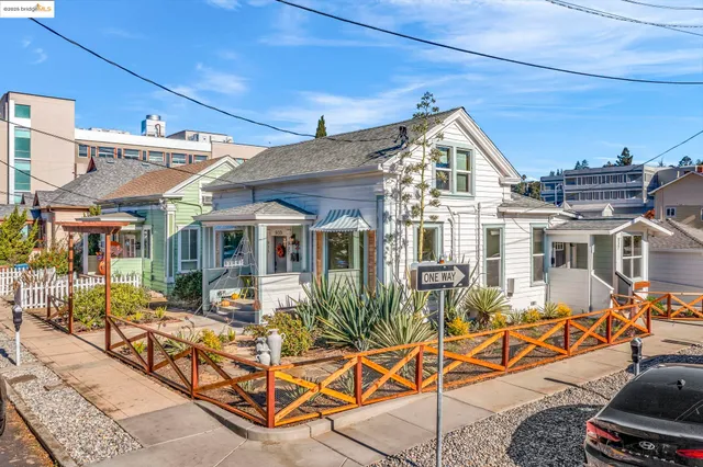 a view of a house with wooden walls and glass windows