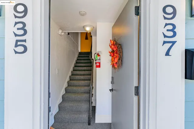 a view of a hallway to of a house