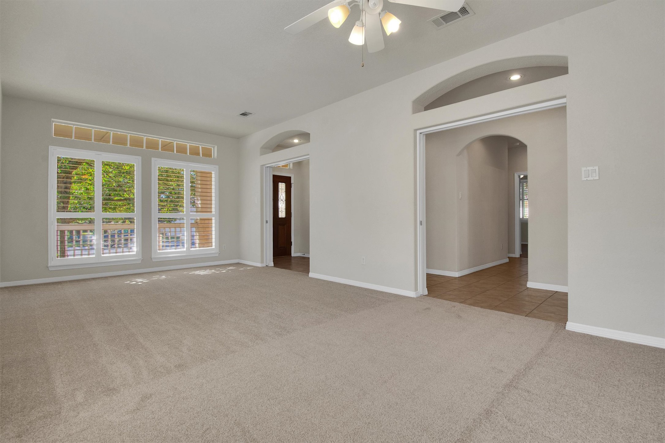102 Lavaca Lane Georgetown, TX 78628 - Photo 7 of 30 The living room shares space with the formal dining area (carpet professionally cleaned)