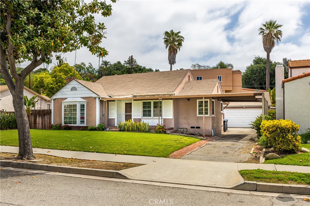 604 Grove Place Glendale, CA 91206 - Photo 2 of 30 a aerial view of a house with a yard and potted plants