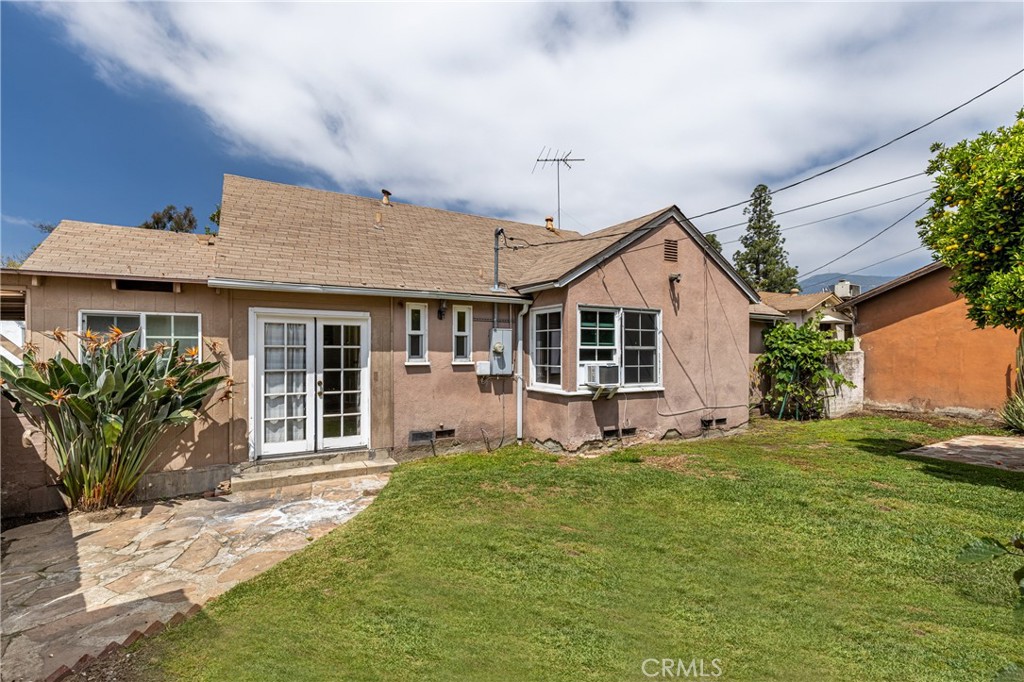 604 Grove Place Glendale, CA 91206 - Photo 26 of 30 a front view of a house with a yard and porch