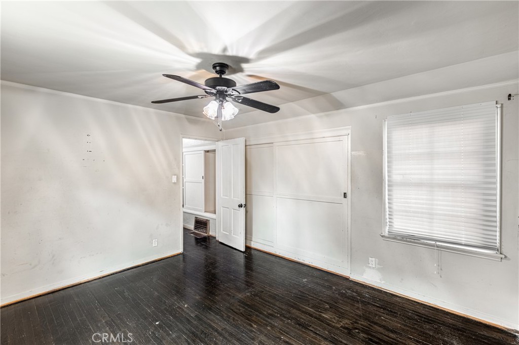 604 Grove Place Glendale, CA 91206 - Photo 7 of 30 wooden floor in an empty room with a window