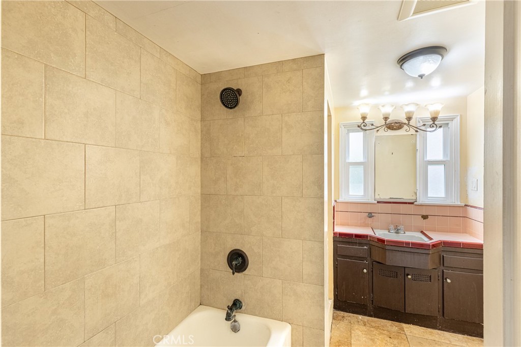 604 Grove Place Glendale, CA 91206 - Photo 9 of 30 a bathroom with a sink and a mirror