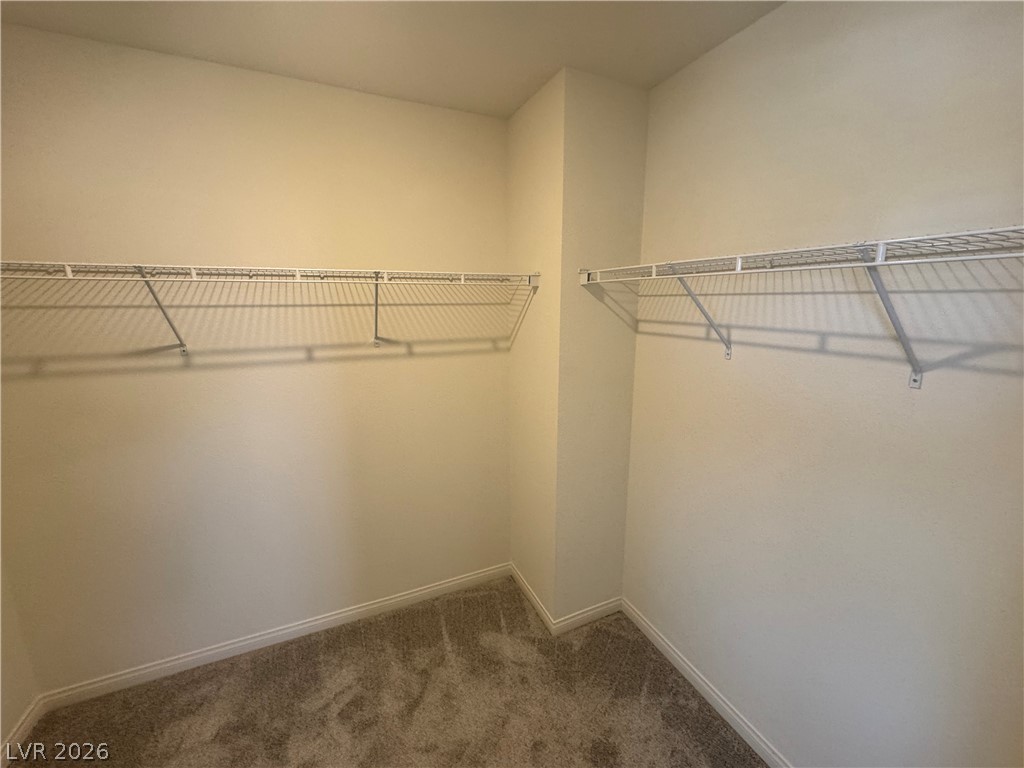 2821 Alcobaca Street Henderson, NV 89044 - Photo 22 of 24 Ample wire shelving units offer plentiful storage in this practical closet space.