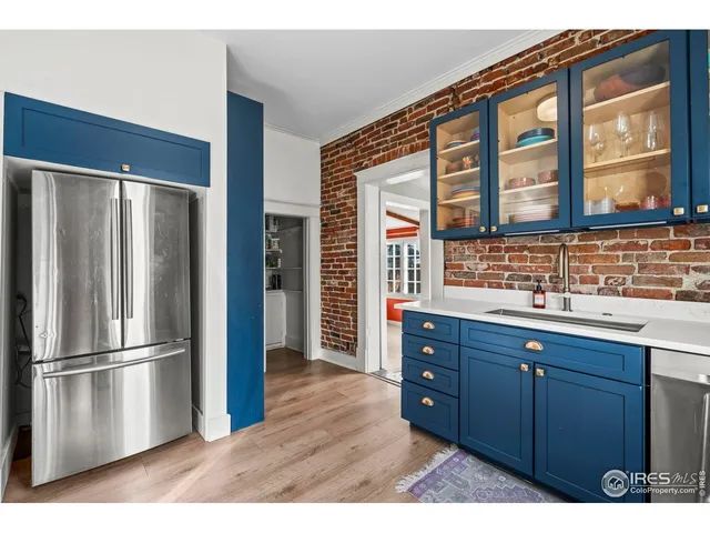 a kitchen with a stove and a microwave