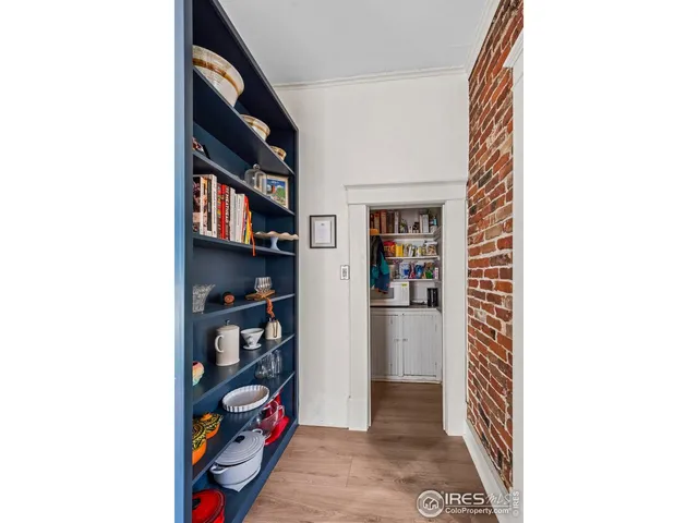 a kitchen with granite countertop stainless steel appliances and a counter space