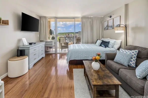 a bathroom with a shower and a sink