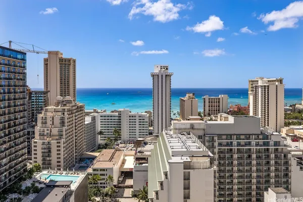 a swimming pool with outdoor seating and yard