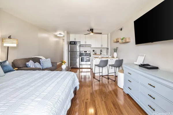 a kitchen with a white cabinets and white appliances