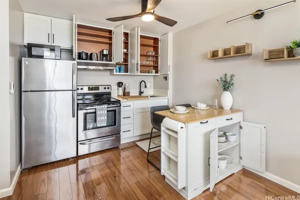 a bedroom with a bed and a table in it