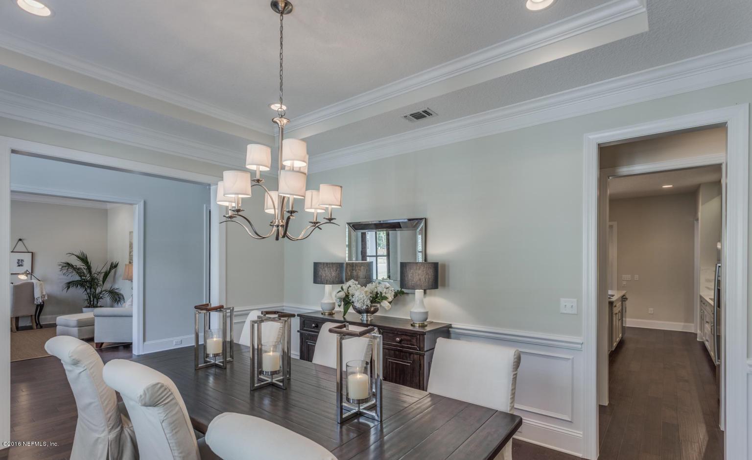 Lot 2 Brady Road Jacksonville, FL 32223 - Photo 5 of 20 a view of a dining room with furniture a chandelier and wooden floor