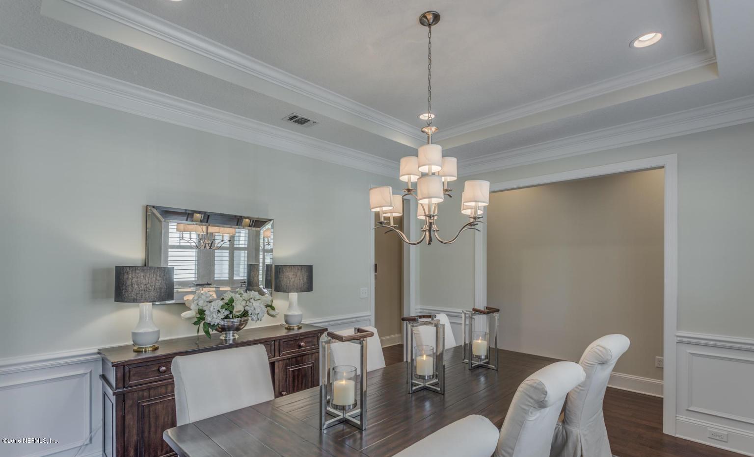 Lot 2 Brady Road Jacksonville, FL 32223 - Photo 6 of 20 a view of a dining room with furniture a chandelier and wooden floor