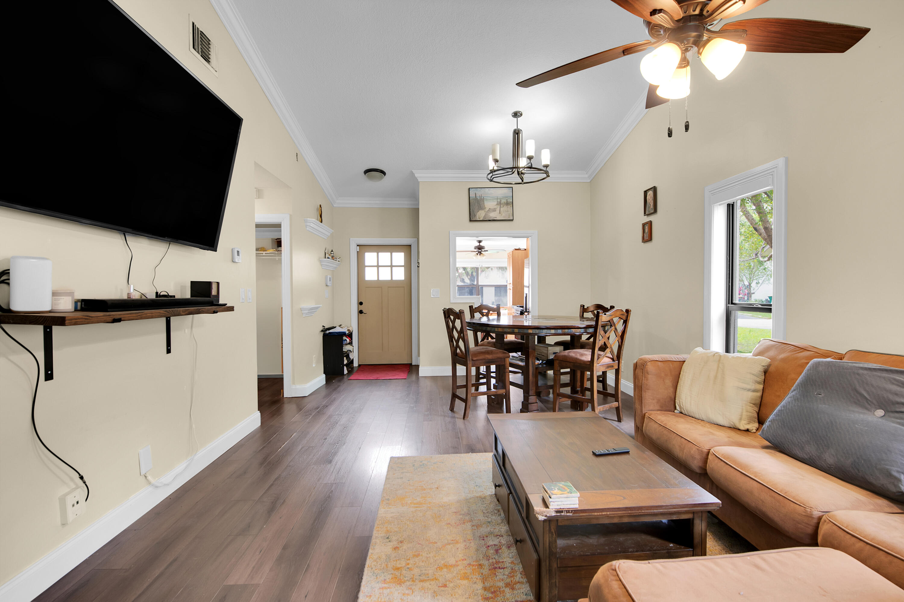 8203 Northwest 100th Way Tamarac, FL 33321 - Photo 14 of 31 a living room with furniture and wooden floor