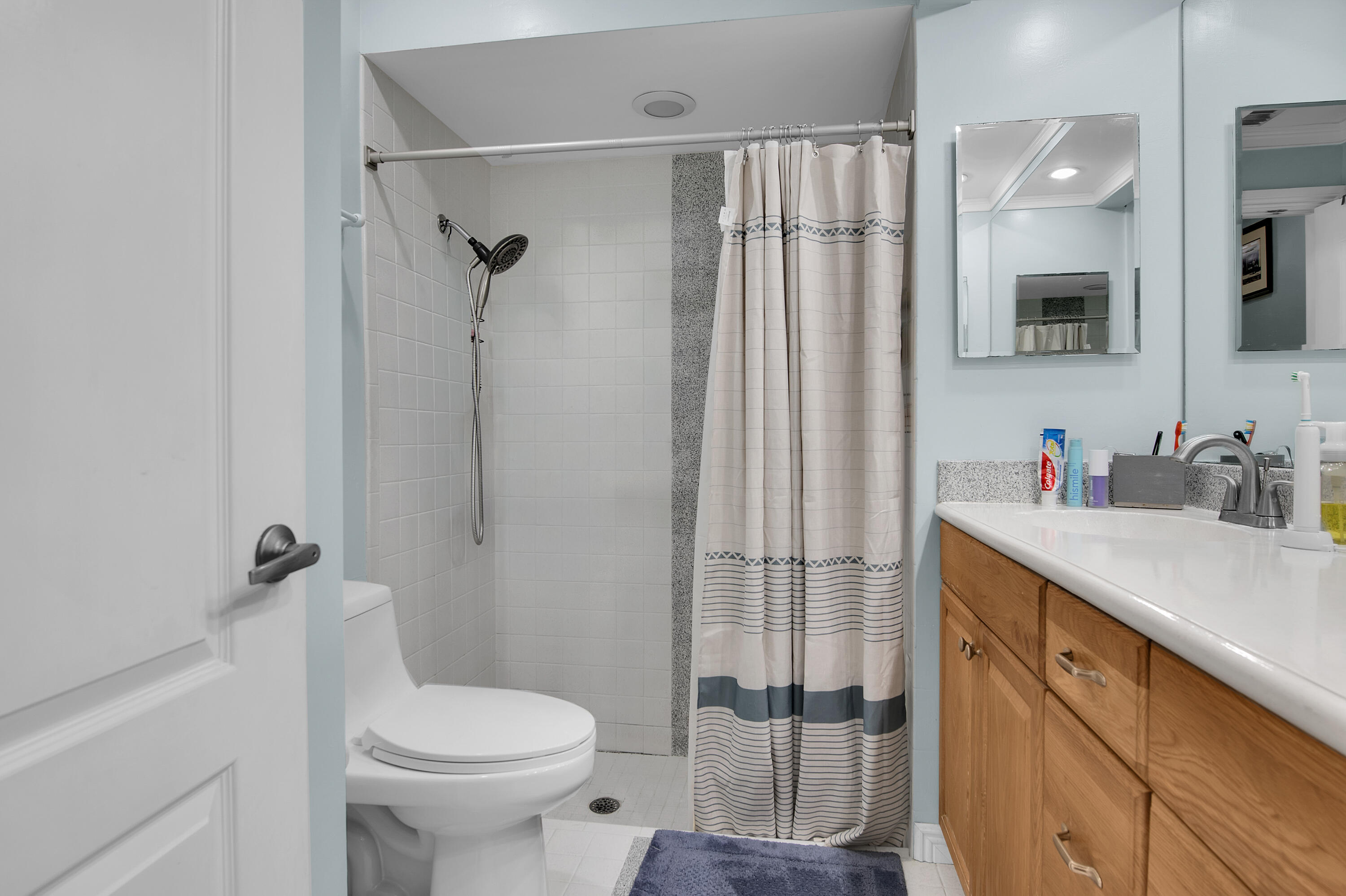 8203 Northwest 100th Way Tamarac, FL 33321 - Photo 21 of 31 a bathroom with a sink toilet and shower