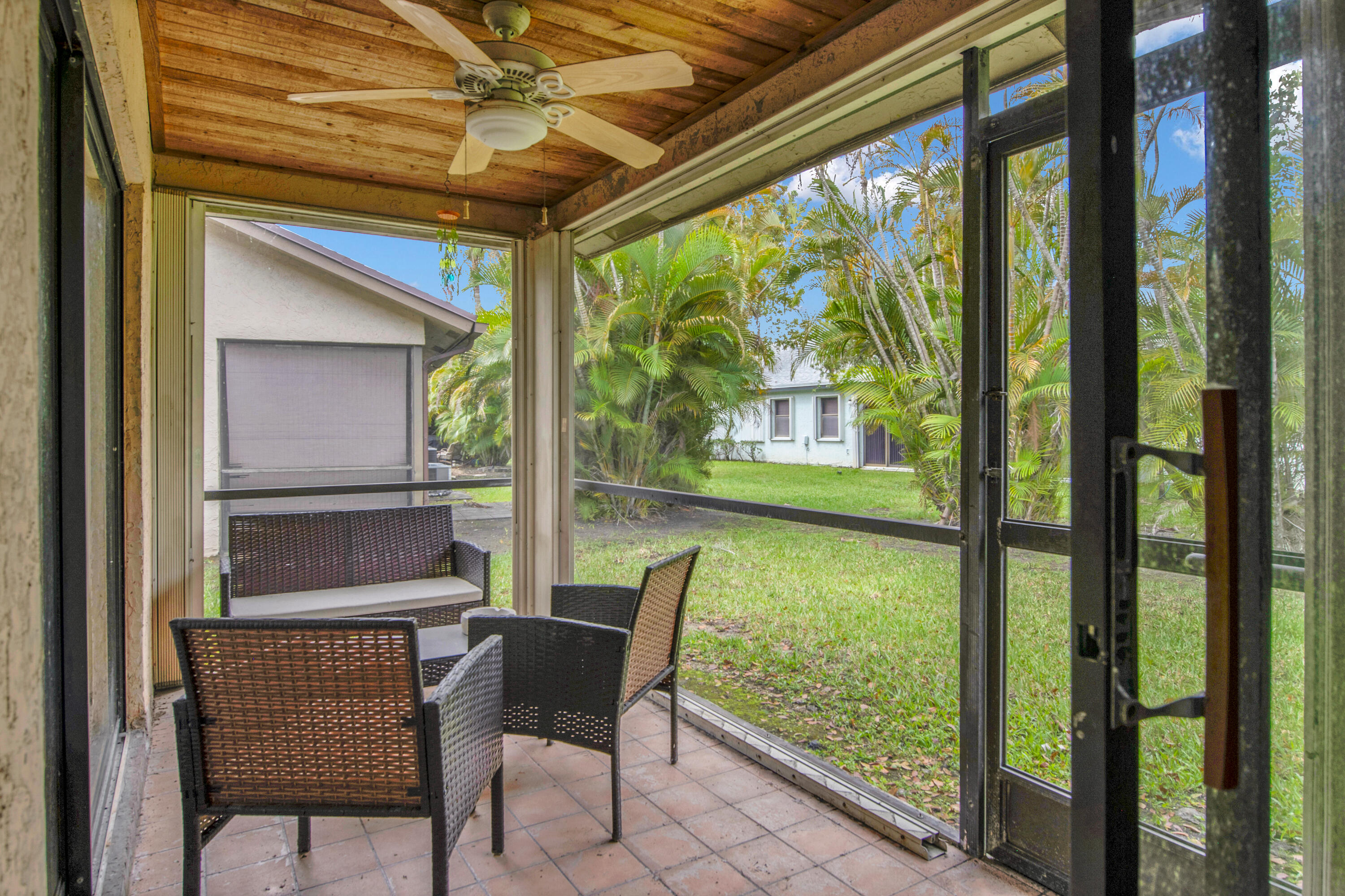 8203 Northwest 100th Way Tamarac, FL 33321 - Photo 23 of 31 a view of two chairs in the balcony