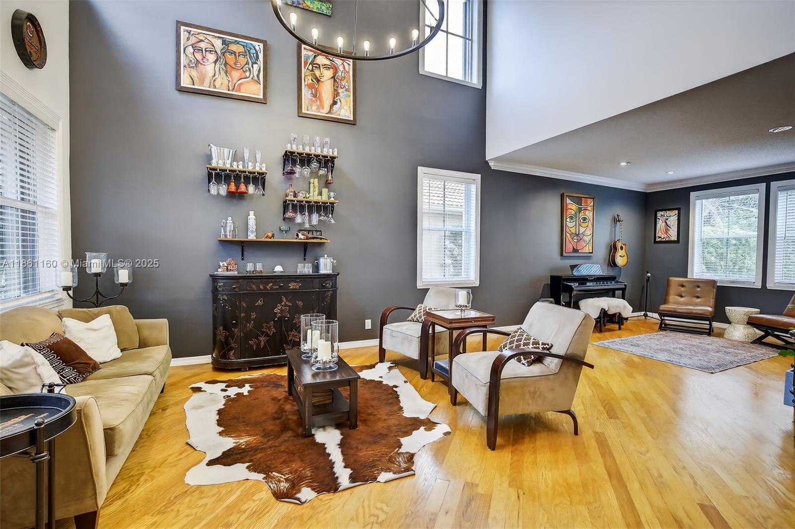 3989 Pinewood Lane Weston, FL 33331 - Photo 3 of 53 a living room with furniture and a fireplace