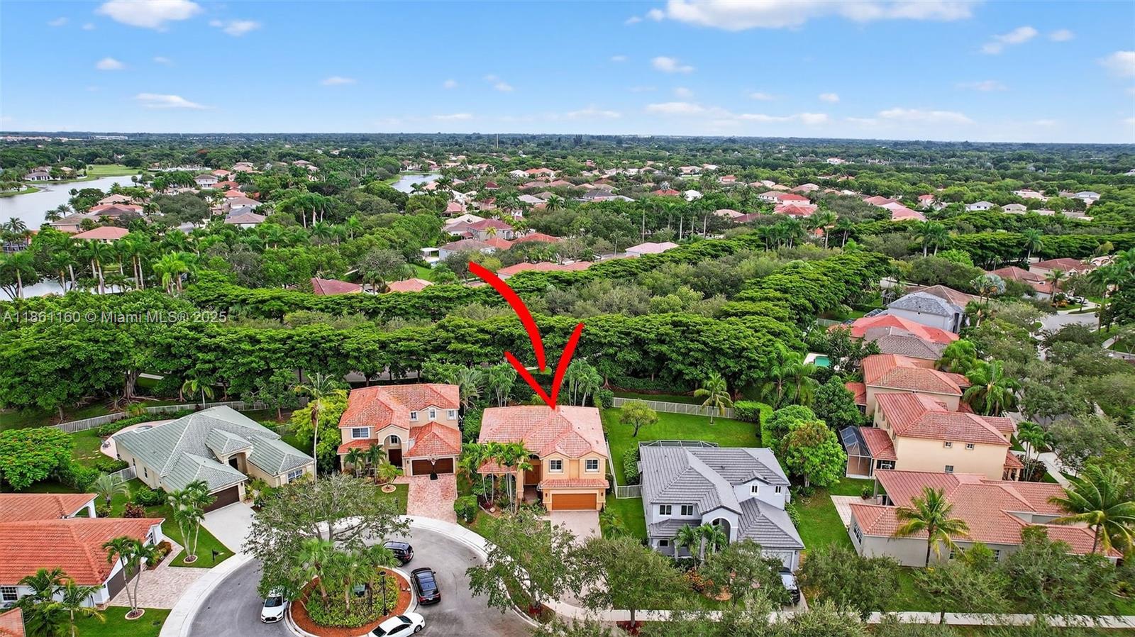 3989 Pinewood Lane Weston, FL 33331 - Photo 42 of 53 an aerial view of residential houses with outdoor space and trees
