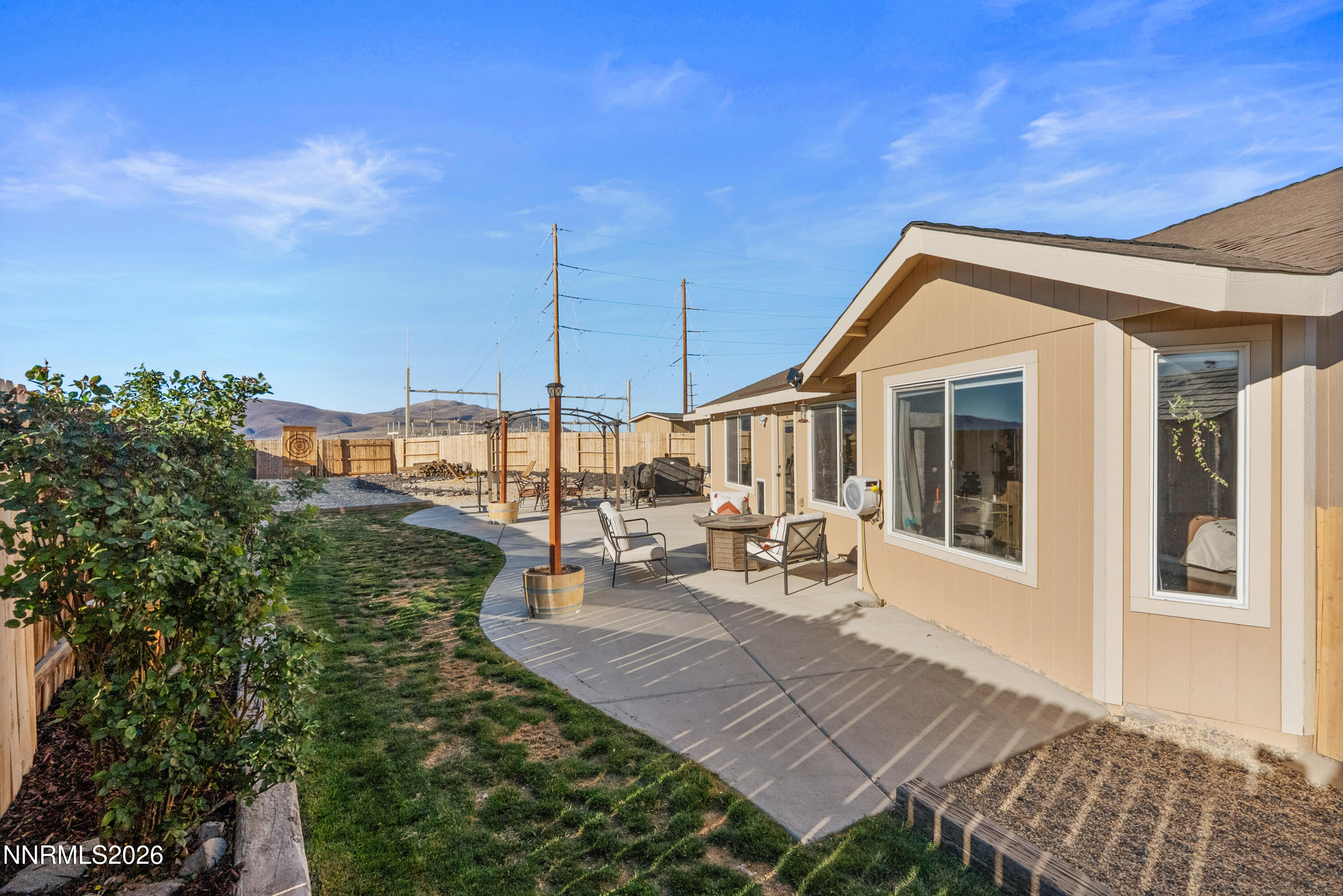 552 Spur Court Fernley, NV 89408 - Photo 38 of 46 a view of a house with sitting area and furniture