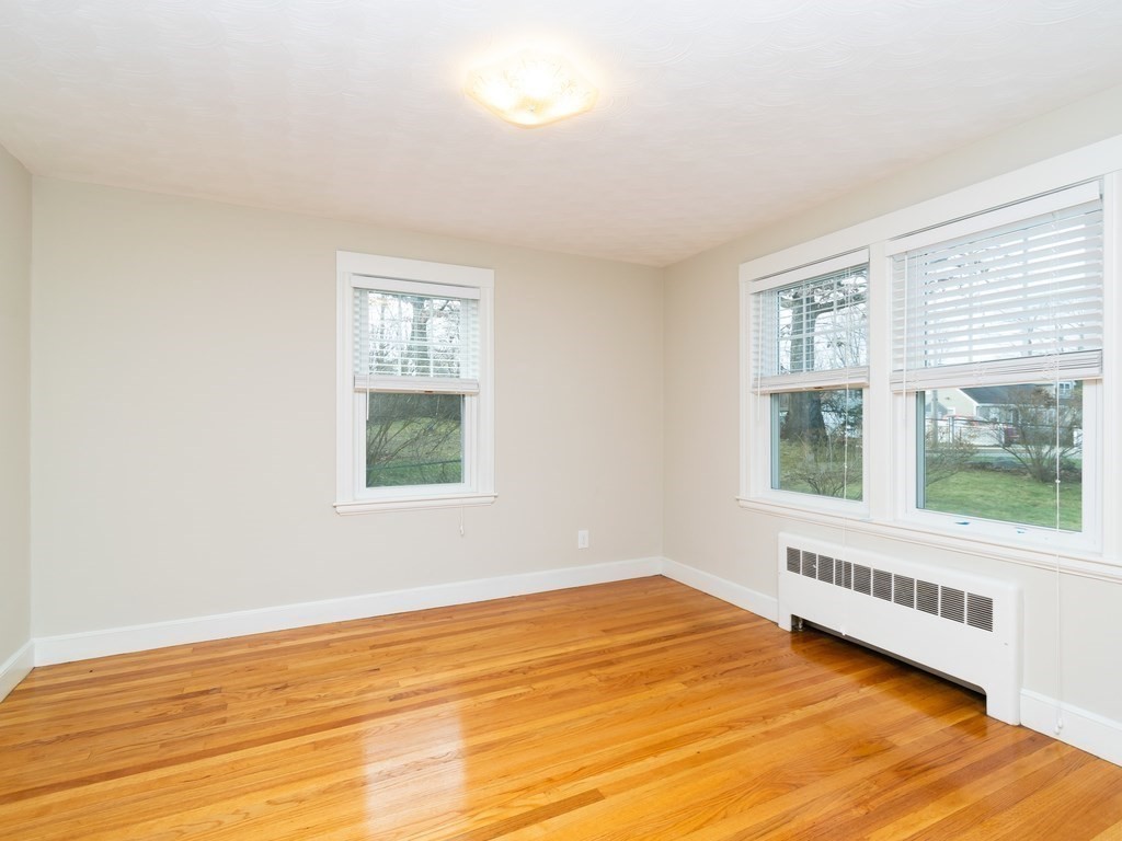 7 Mangano Court, Unit 2 Watertown, MA 02472 - Photo 9 of 14 a view of an empty room with a window