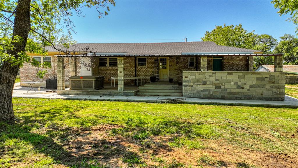 760 College Farm Road Stephenville, TX 76401 - Photo 26 of 32 a front view of a house with a yard
