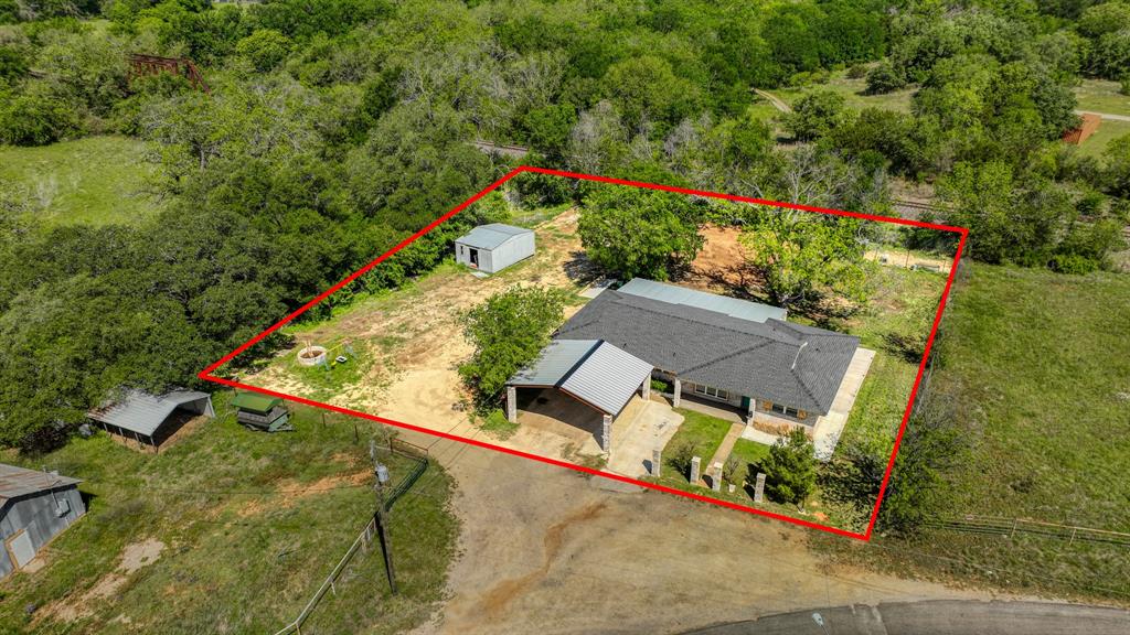 760 College Farm Road Stephenville, TX 76401 - Photo 28 of 32 an aerial view of houses with yard