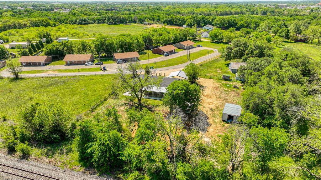 760 College Farm Road Stephenville, TX 76401 - Photo 31 of 32 a view of a lake with a houses