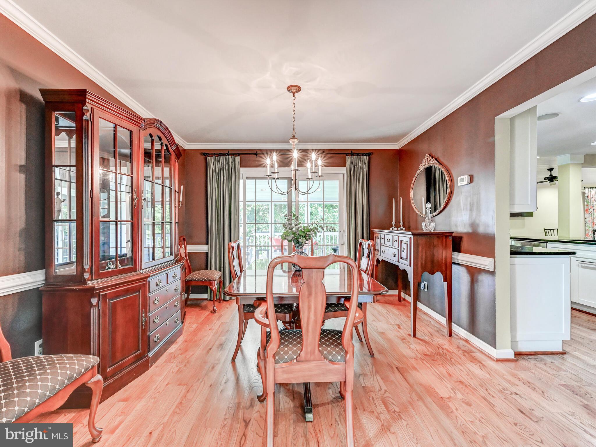 265 Hunters Ridge Road Lutherville-Timonium, MD 21093 - Photo 14 of 42 a view of a dining room with furniture window and wooden floor