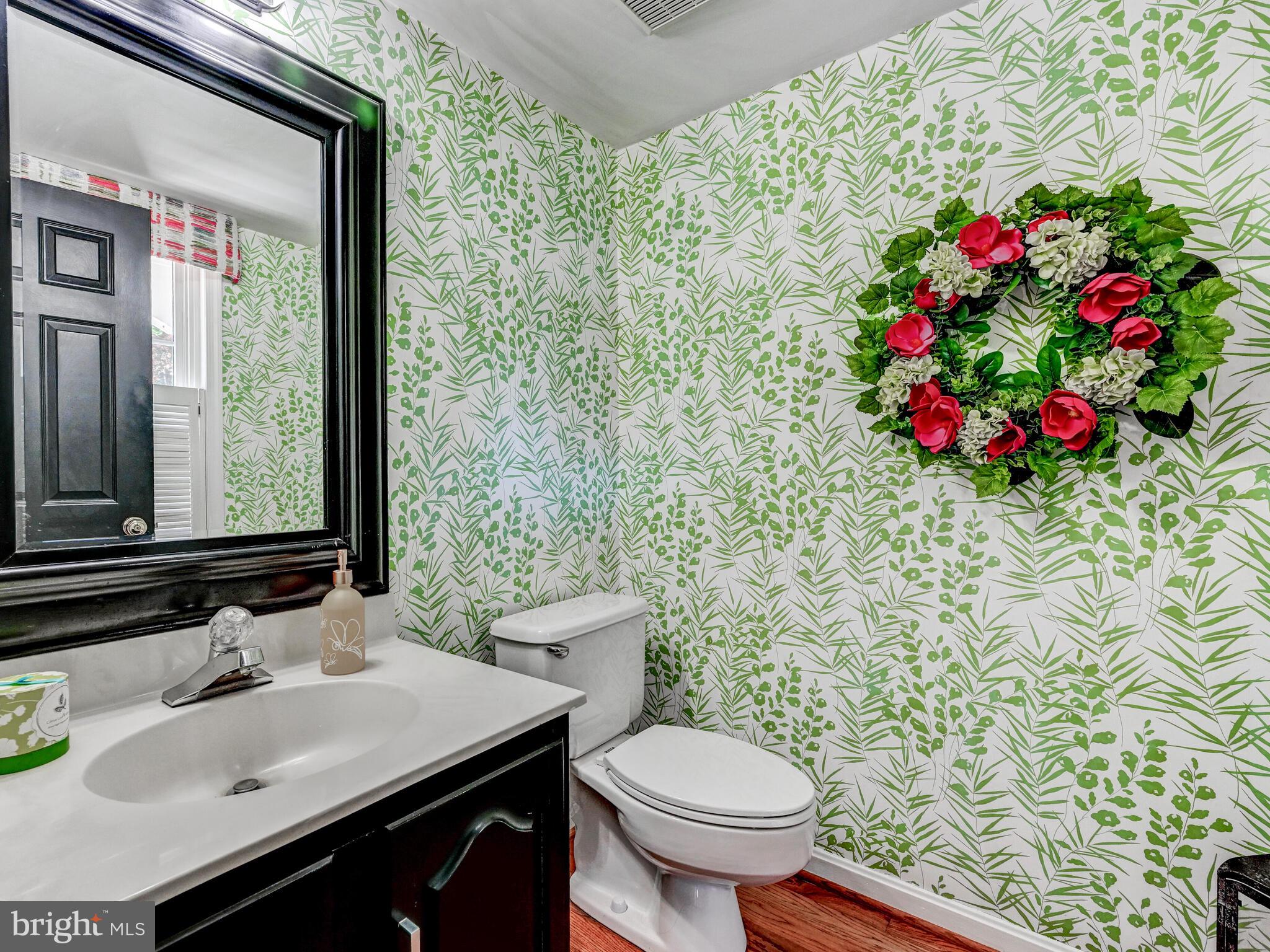 265 Hunters Ridge Road Lutherville-Timonium, MD 21093 - Photo 29 of 42 a bathroom with a sink toilet and window