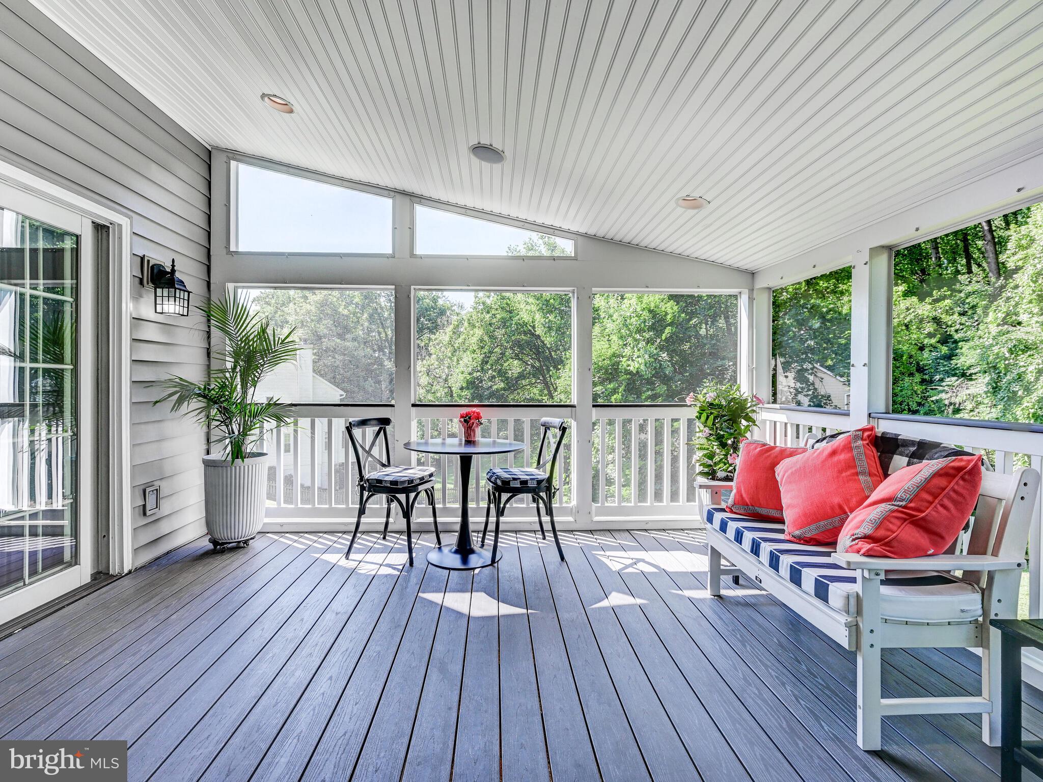 265 Hunters Ridge Road Lutherville-Timonium, MD 21093 - Photo 31 of 42 an outdoor sitting area with furniture and wooden floor