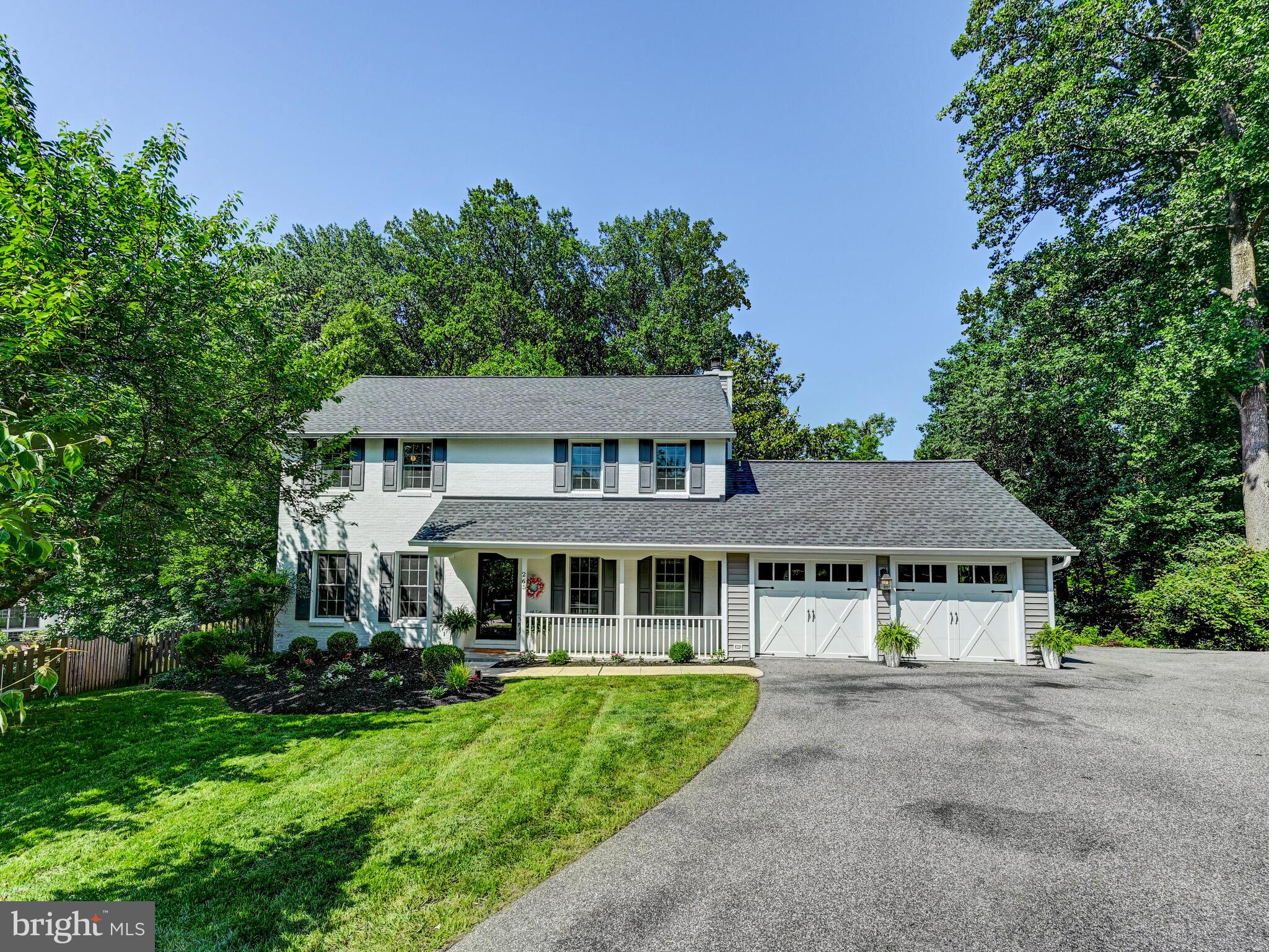265 Hunters Ridge Road Lutherville-Timonium, MD 21093 - Photo 38 of 42 front view of a house with a yard