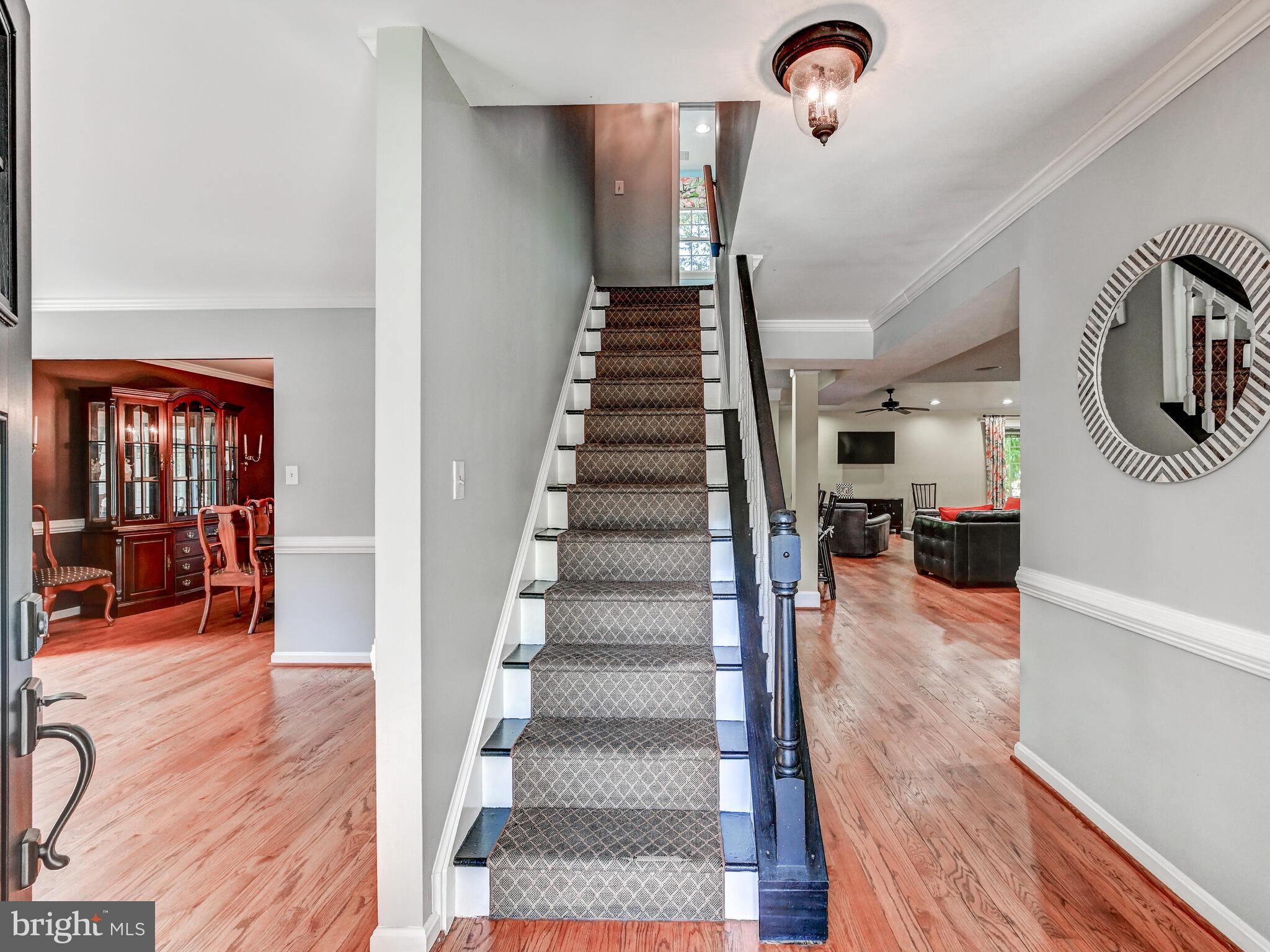 265 Hunters Ridge Road Lutherville-Timonium, MD 21093 - Photo 4 of 42 a view of entryway and hall with wooden floor