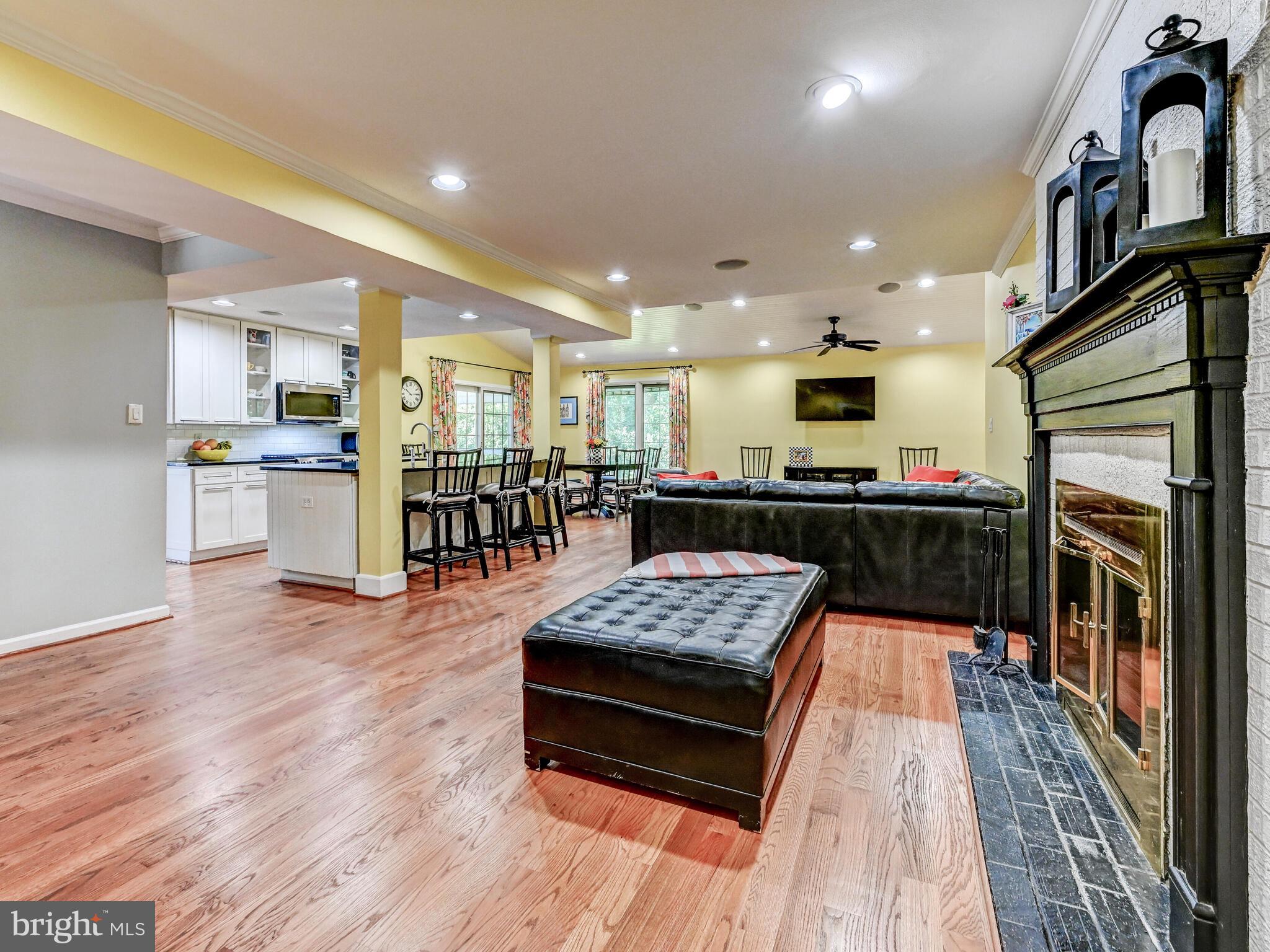 265 Hunters Ridge Road Lutherville-Timonium, MD 21093 - Photo 6 of 42 a kitchen with stainless steel appliances granite countertop a refrigerator a stove top oven and a sink