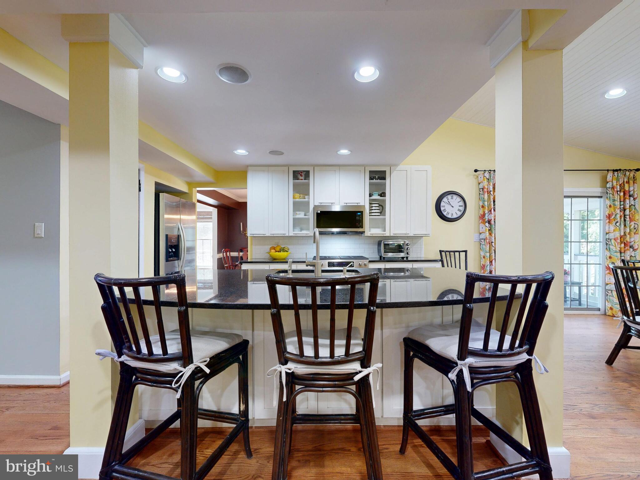265 Hunters Ridge Road Lutherville-Timonium, MD 21093 - Photo 9 of 42 a view of a dining room with furniture and a window