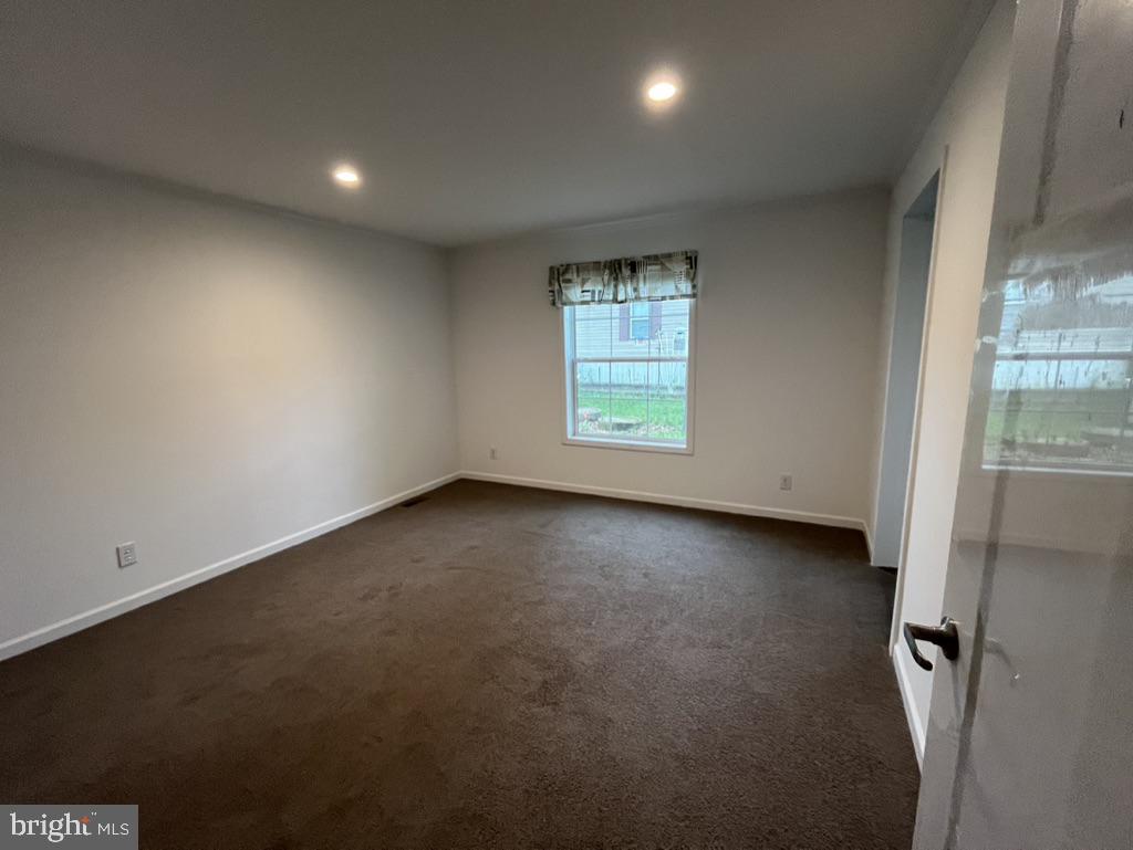 197 Spring Lane Doylestown, PA 18901 - Photo 16 of 17 an empty room with windows