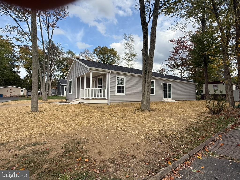 197 Spring Lane Doylestown, PA 18901 - Photo 3 of 17 a house with trees in the background