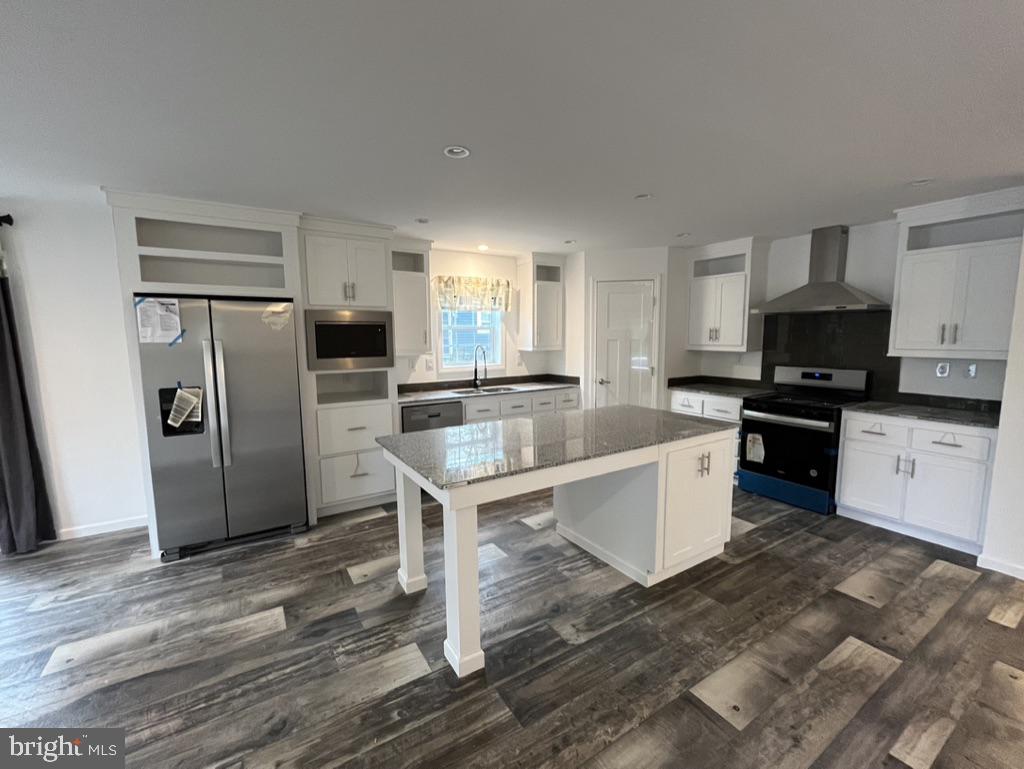 197 Spring Lane Doylestown, PA 18901 - Photo 10 of 17 a kitchen that has a sink cabinets stainless steel appliances and a window