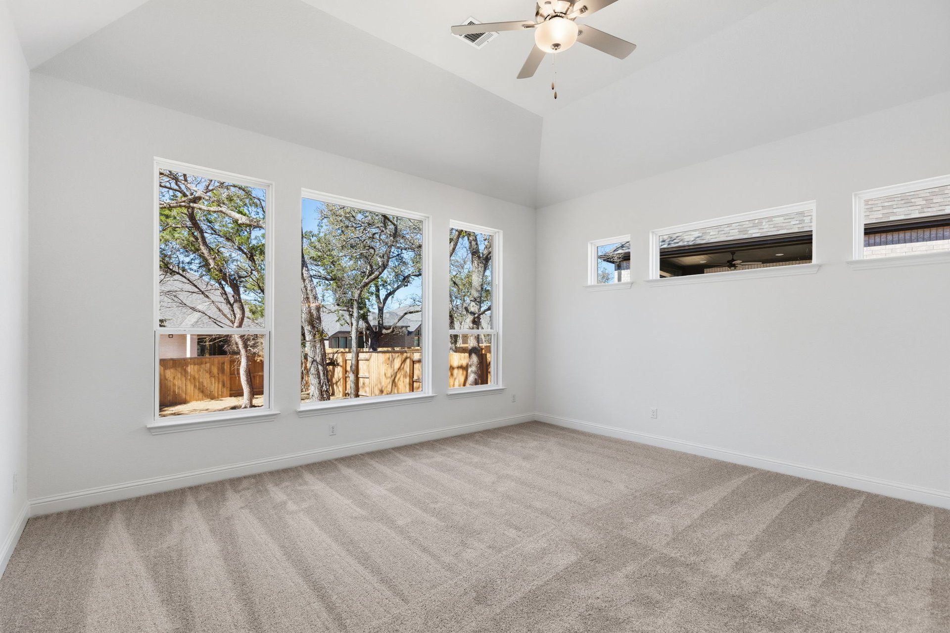 372 Wood Thrush Run Kyle, TX 78640 - Photo 19 of 38 Primary Bedroom with elevated ceiling