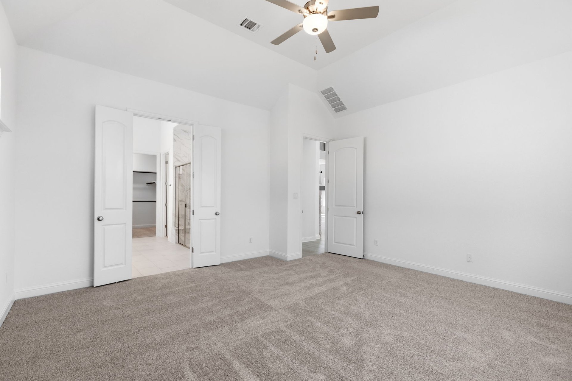 372 Wood Thrush Run Kyle, TX 78640 - Photo 20 of 38 Primary Bedroom with elevated ceiling