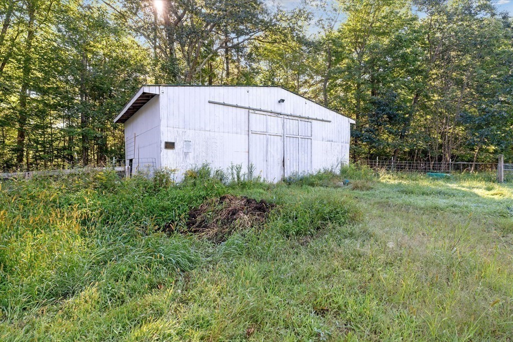 160 Hall Road Winchendon, MA 01475 - Photo 20 of 35 a backyard of a house with lots of green space