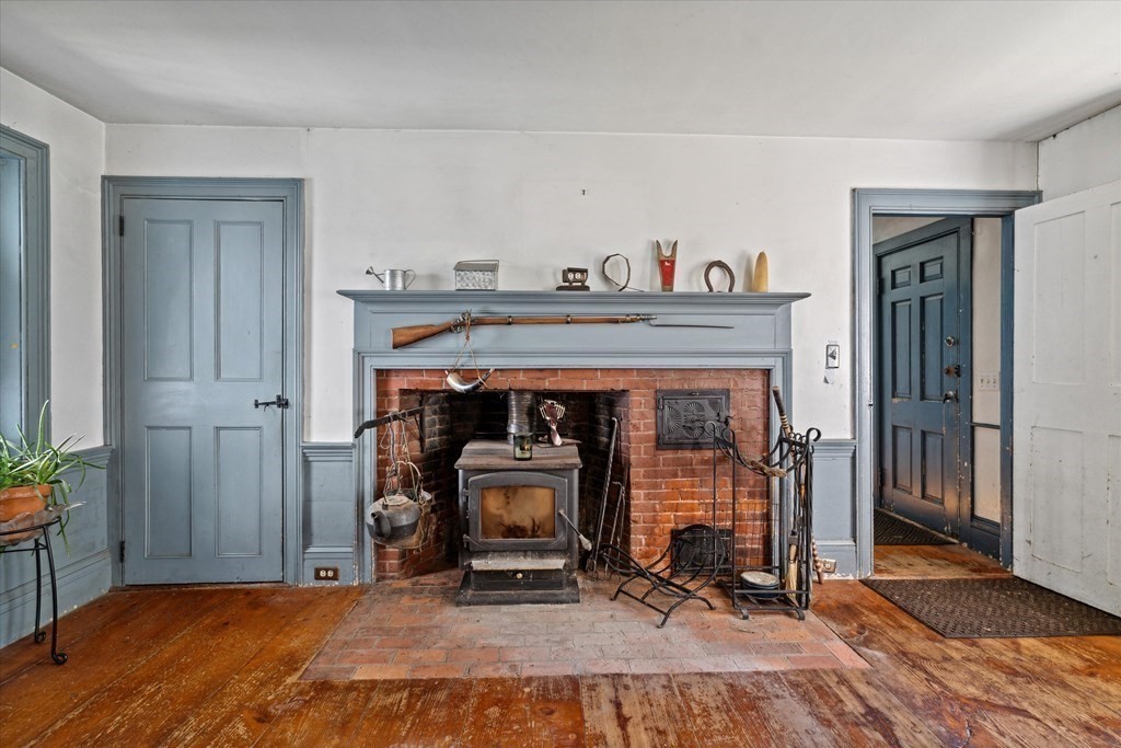 160 Hall Road Winchendon, MA 01475 - Photo 10 of 35 a view of an empty room with furniture and a fireplace