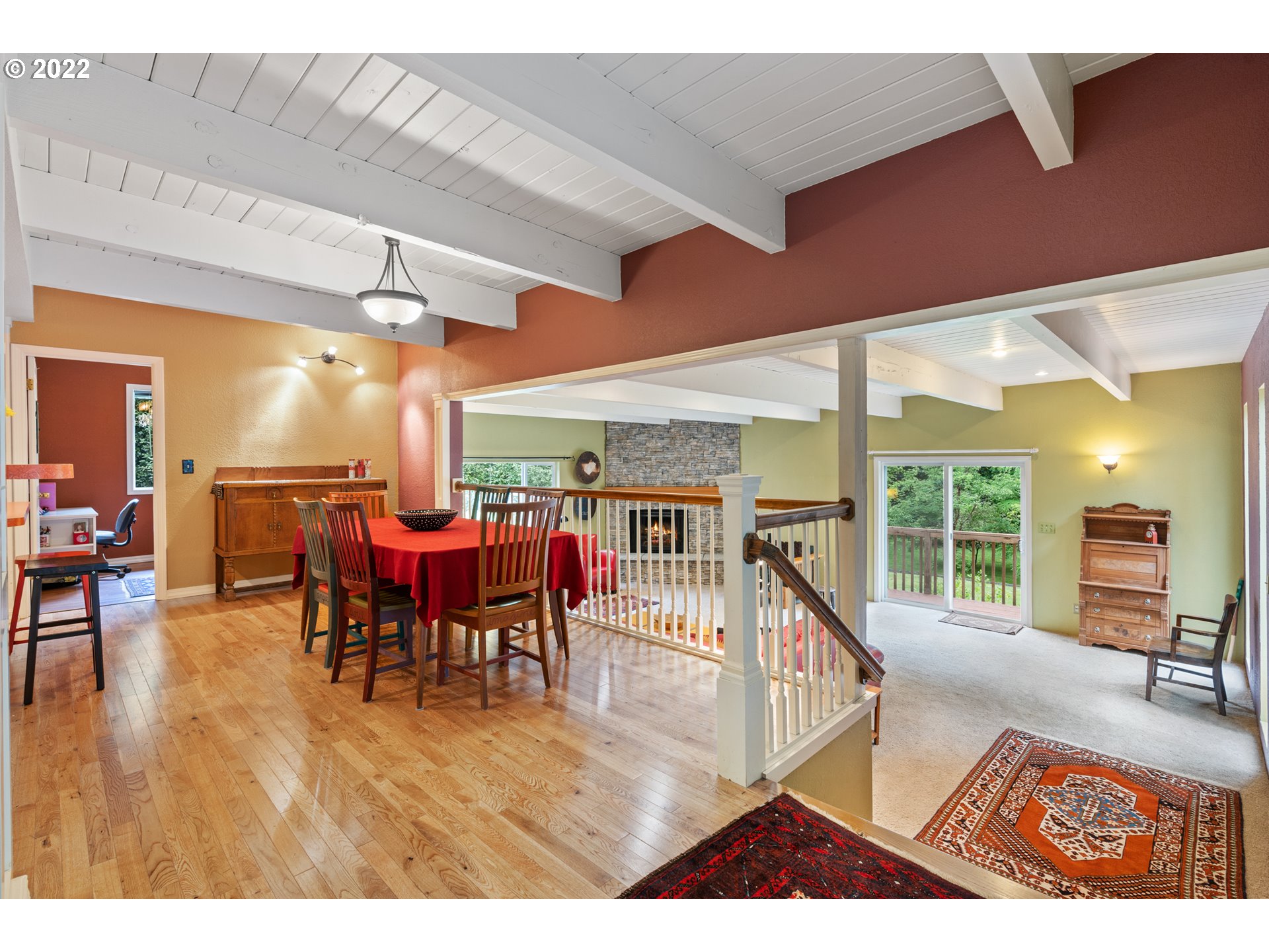 3201 Northwest 199th Street Ridgefield, WA 98642 - Photo 11 of 32 a view of a dining room with furniture window and wooden floor
