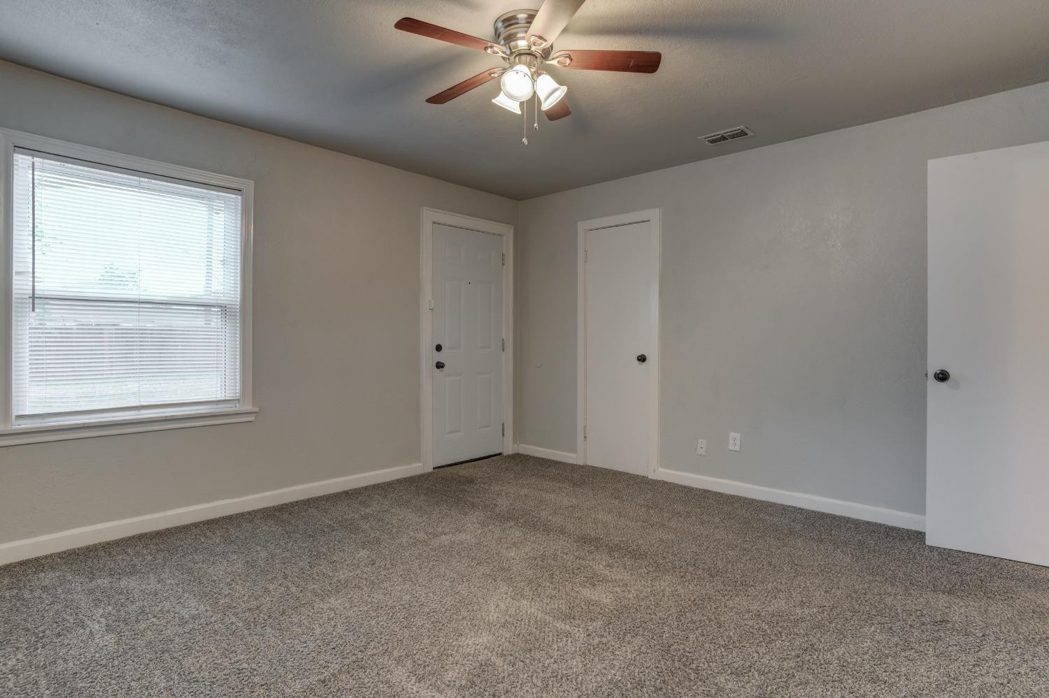 3415 27th Street Lubbock, TX 79410 - Photo 24 of 30 a view of an empty room with a window
