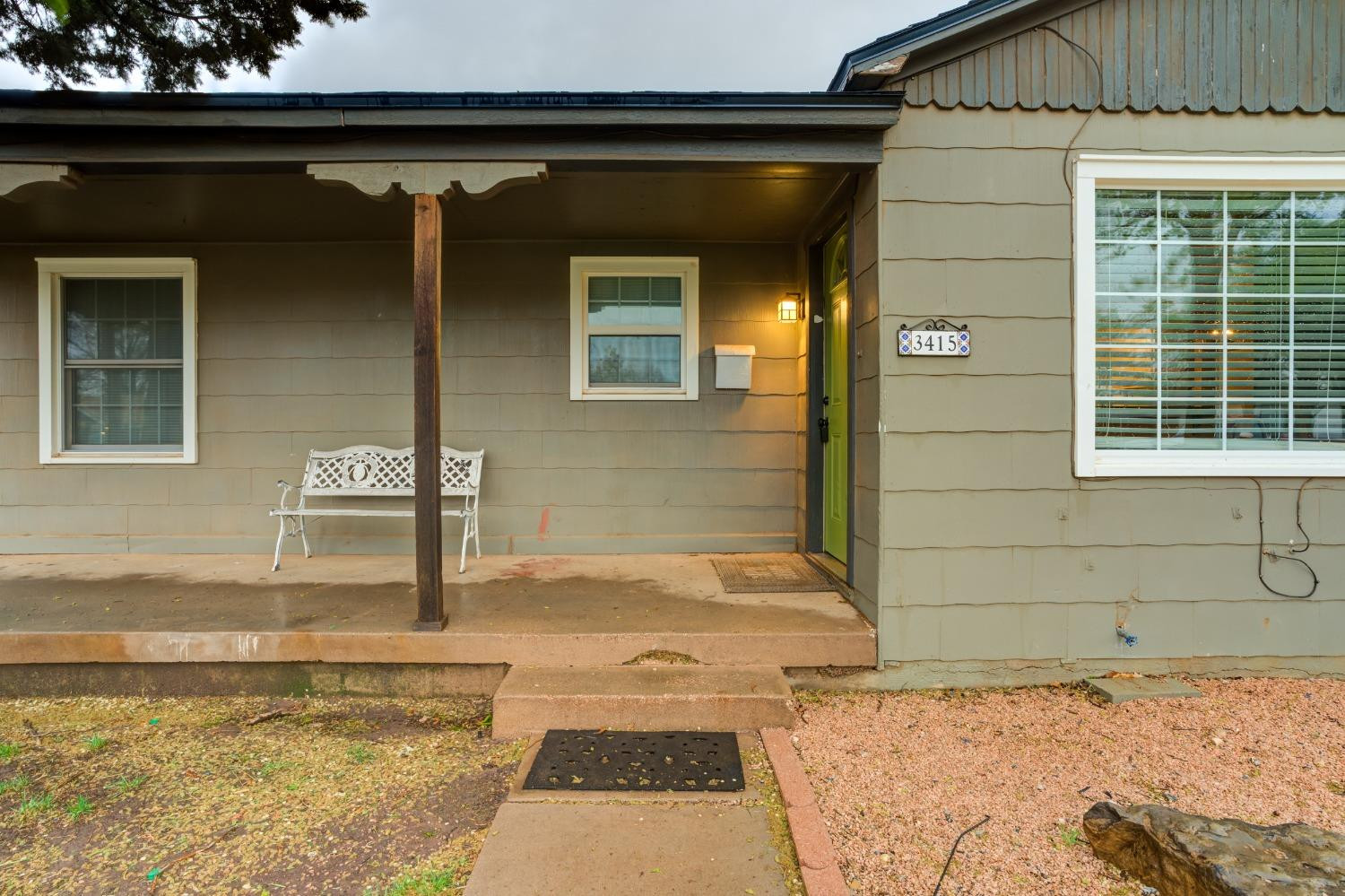 3415 27th Street Lubbock, TX 79410 - Photo 3 of 30 a bathroom with a tub and shower