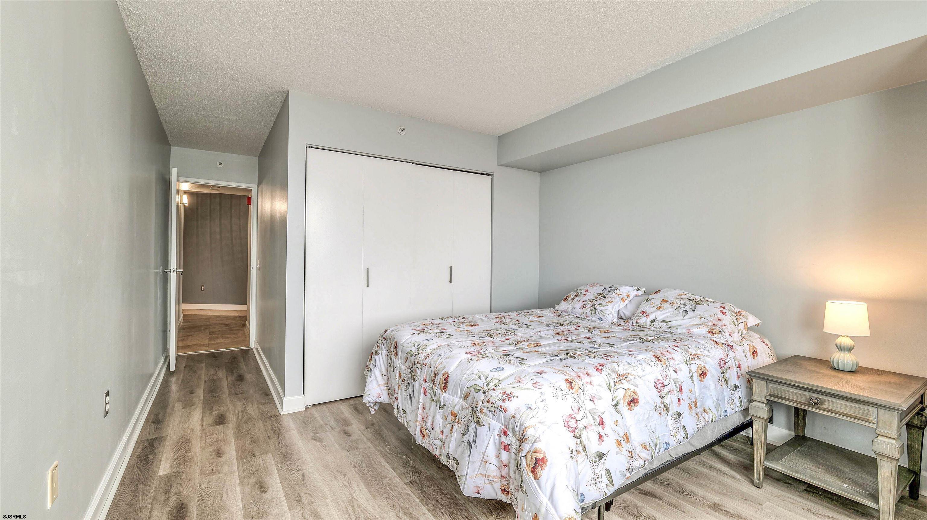 526 Pacific Avenue, Unit 903 Atlantic City, NJ 08401 - Photo 22 of 43 a bedroom with a bed and a window